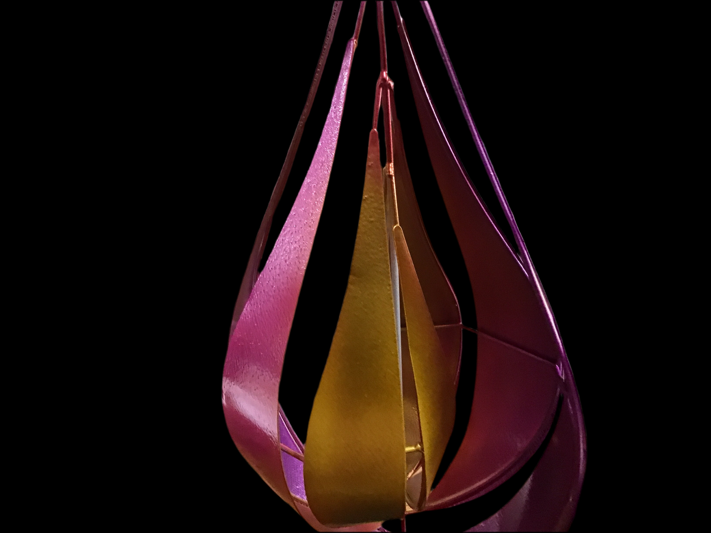 Teardrop metal spinner