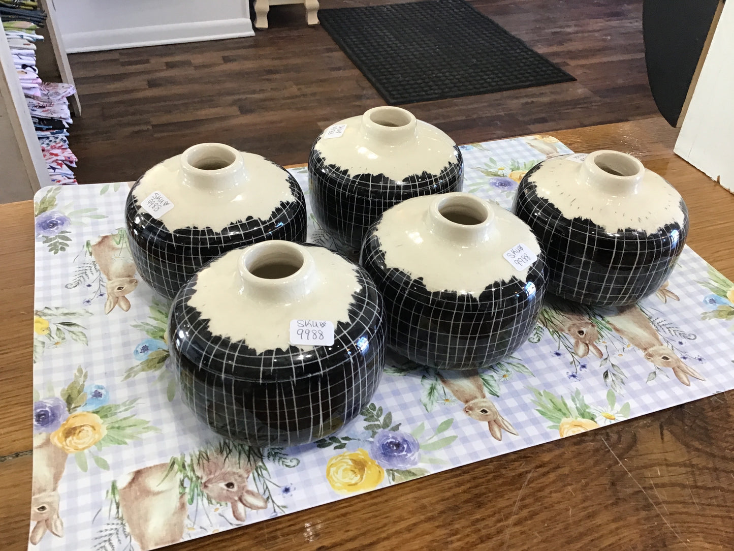 Short black and white bud vase