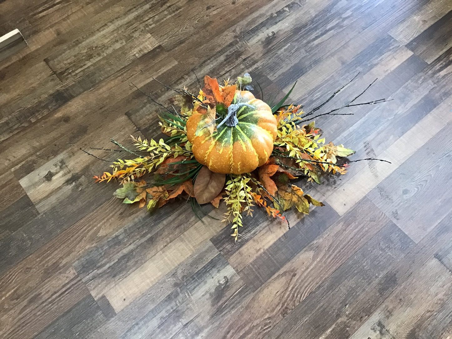Floral pumpkin centerpiece for table
