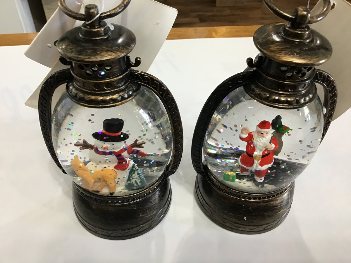 Snow globes two different styles priced individually