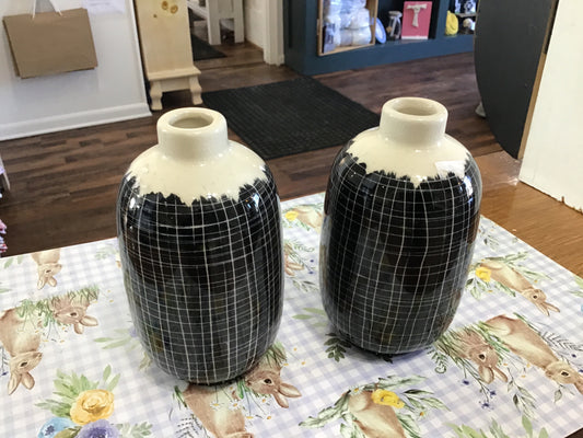 Tall black and white bud vase