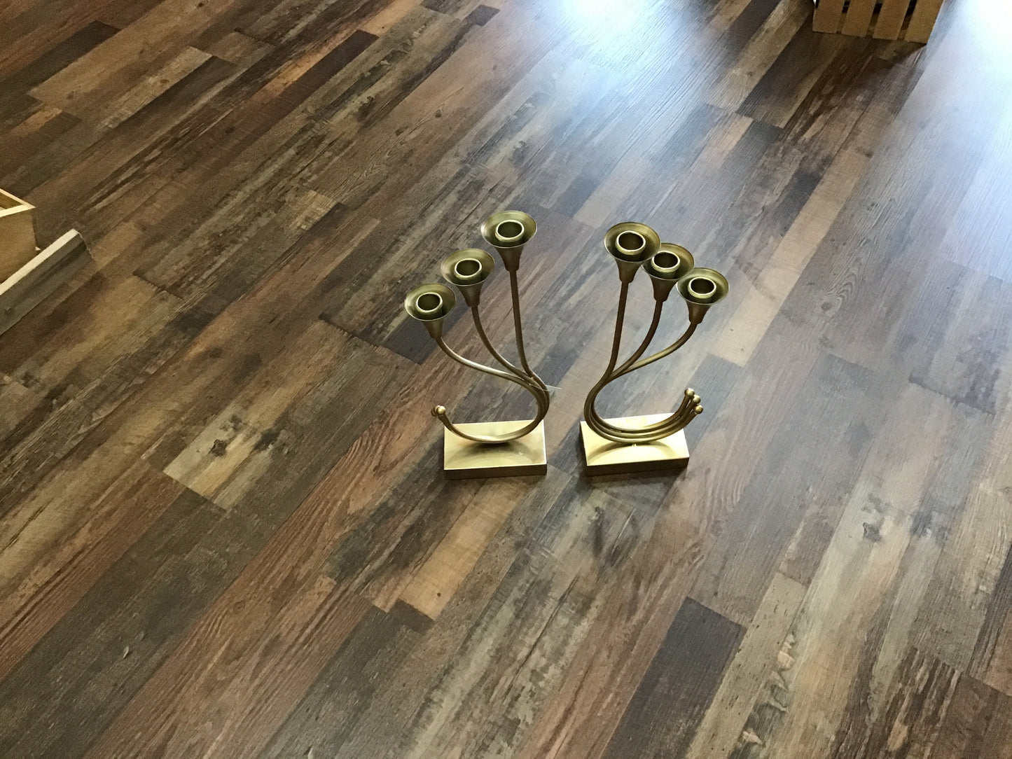 Small Gold tone  candlesticks set of two each one 17 inches tall 7 inches wide metal