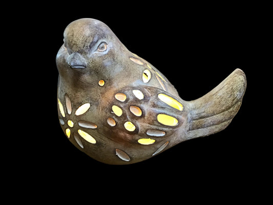 Large resin wood look bird lights up
