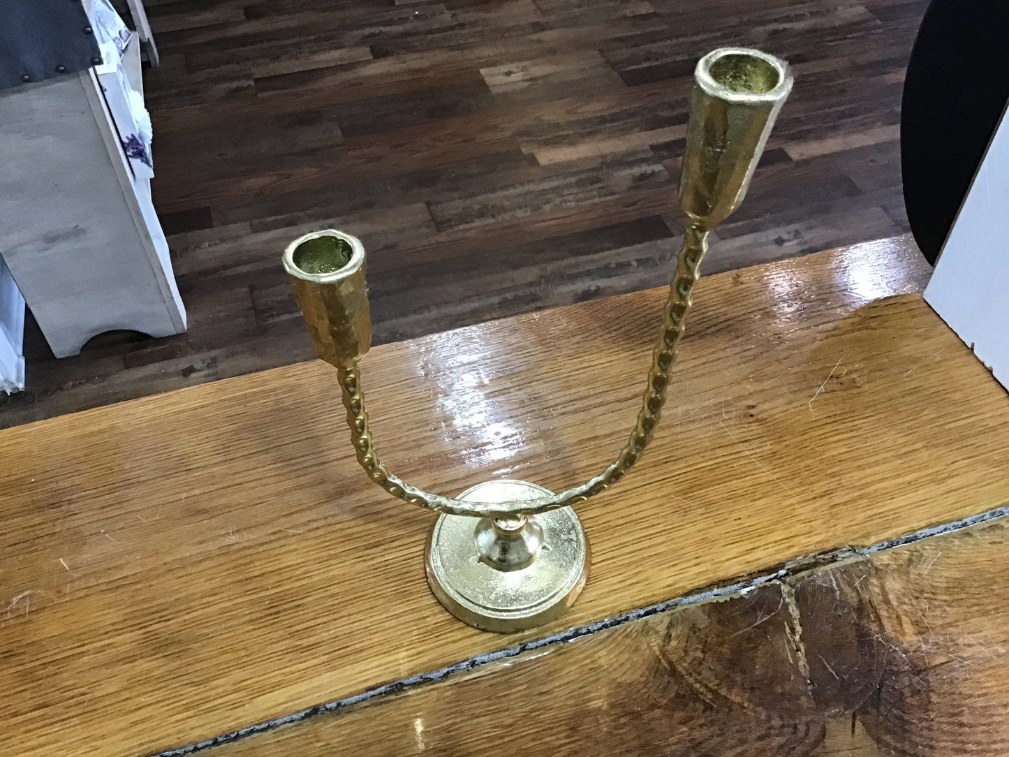 Gold tone metal candlestick  12 inches tall 7 inches wide