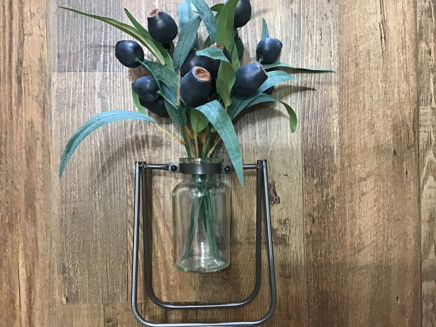 Glass and iron vase