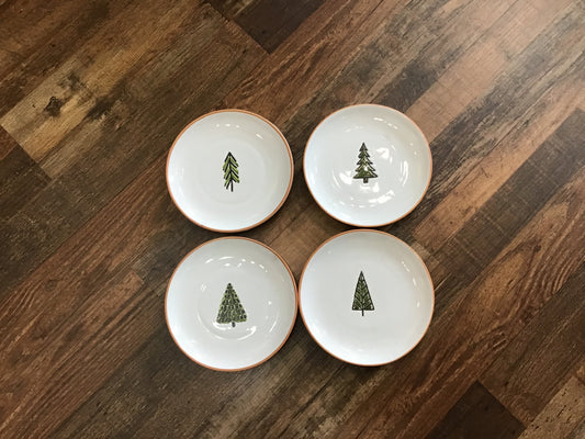Set of four dessert plates with tree decoration on them ceramic