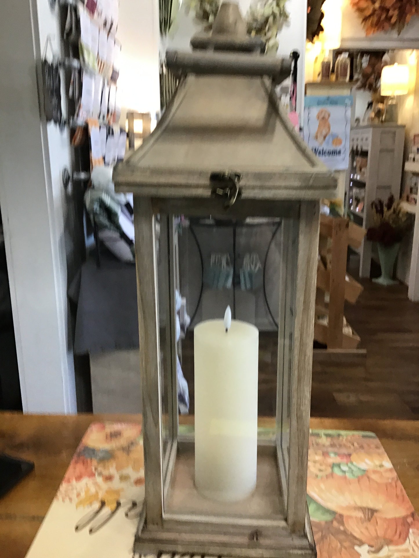 Large wood lantern with candle