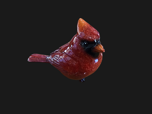 Ceramic cardinal three inches tall four inches long